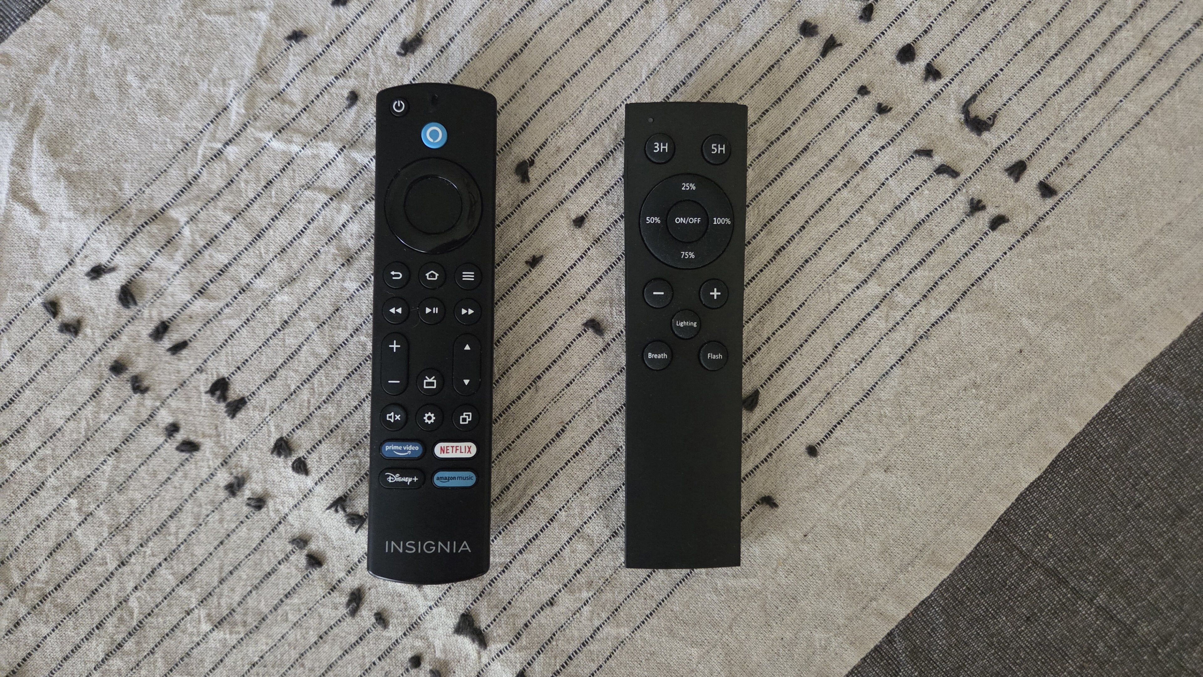 A Bluetooth and infrared remote next to each other, and an explainer of the differences.