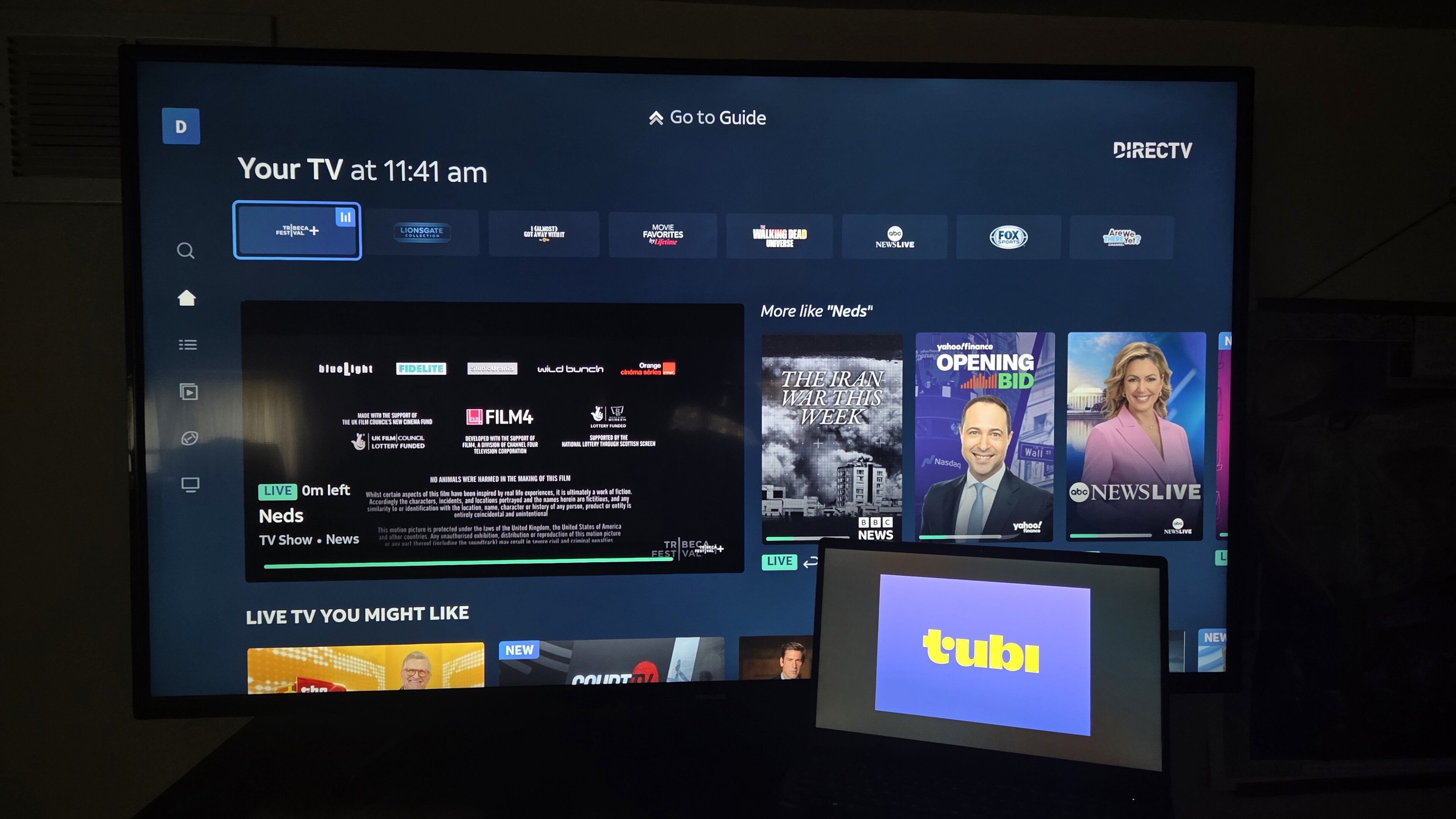 DIRECTV on a TV and Tubi on a computer -- comparing live TV and FAST.