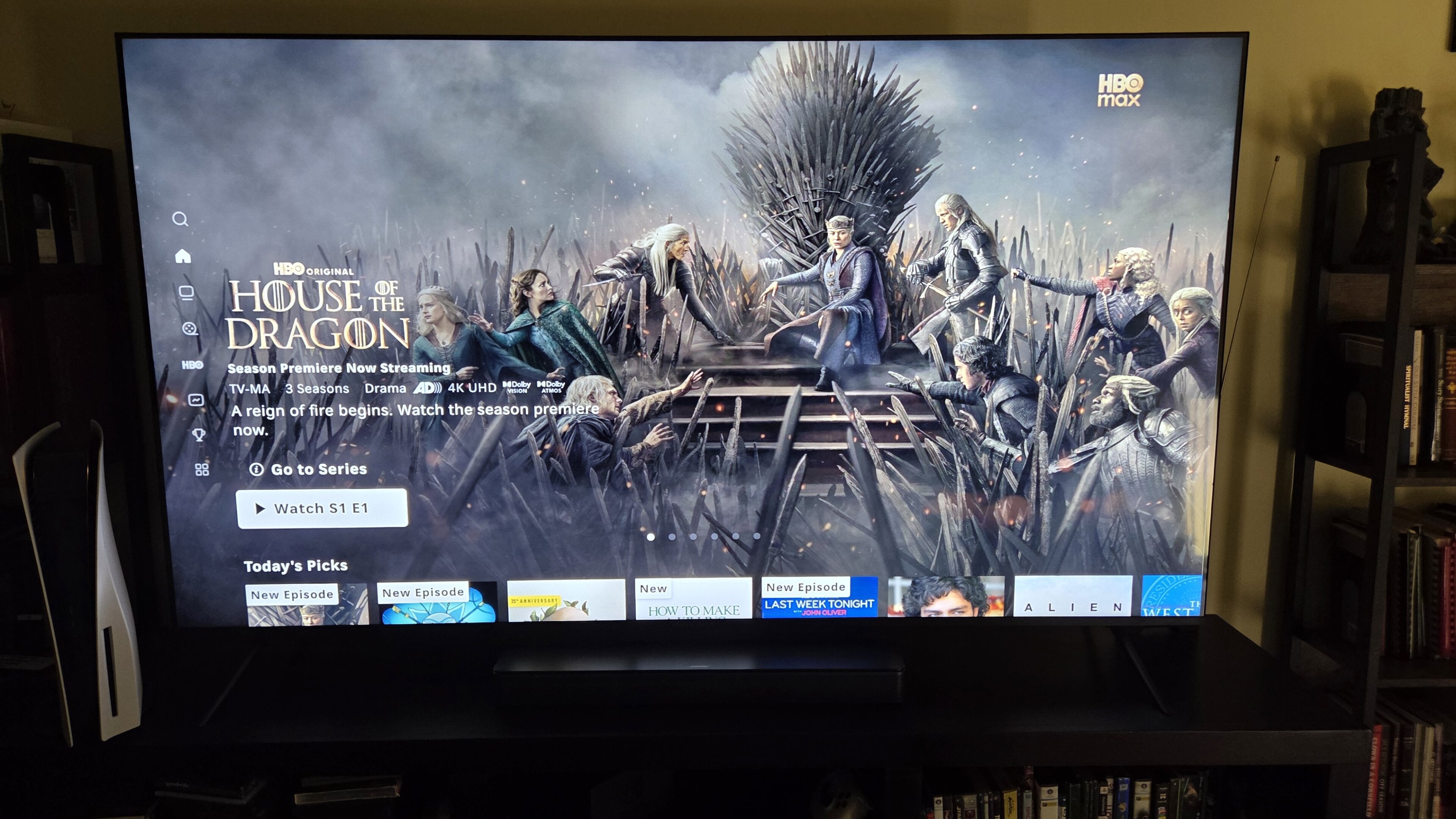 The HBO Max home screen on a TV, and a review of the streaming service.