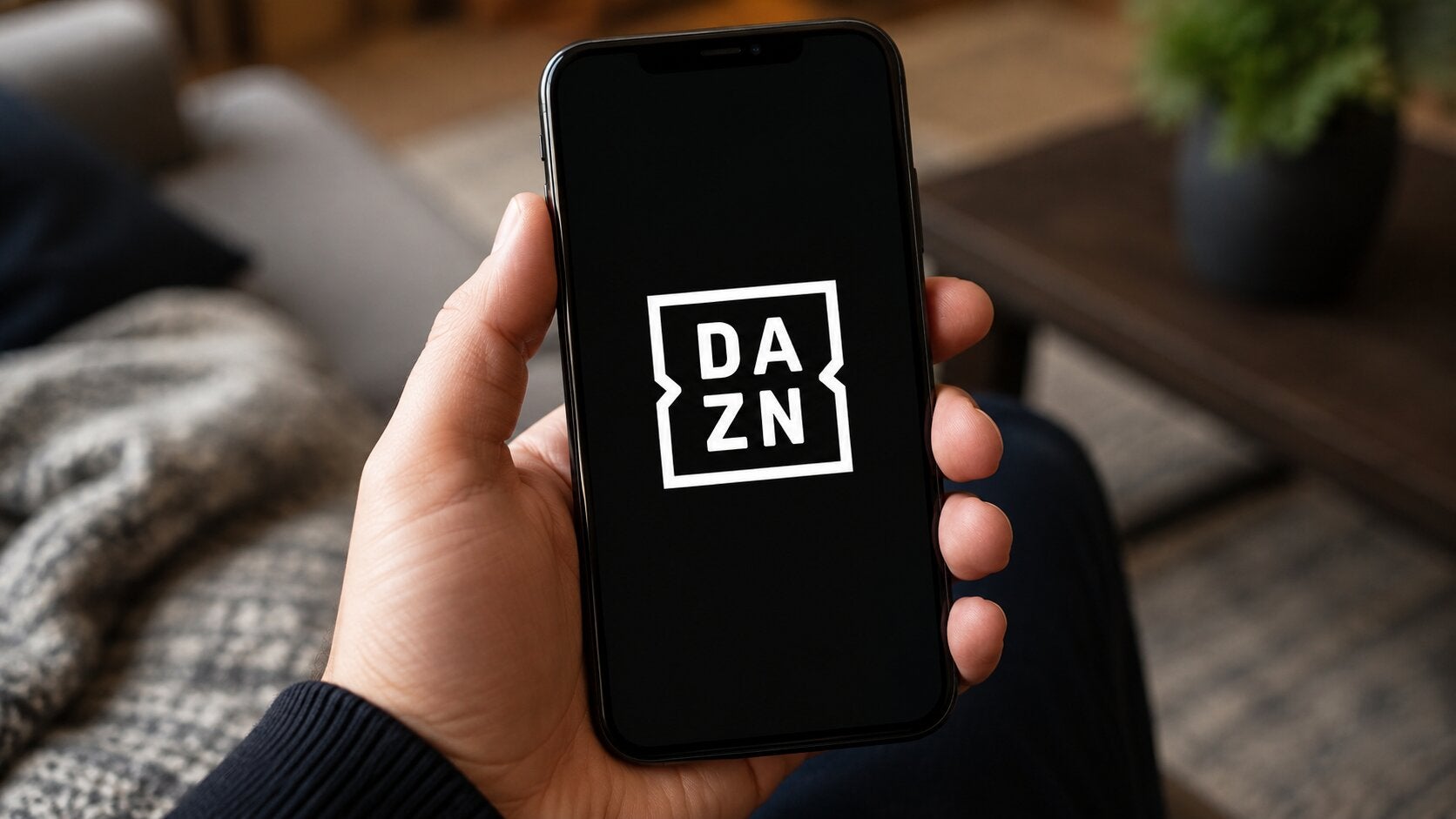 The DAZN logo on a smart phone, and instructions for canceling a subscription.