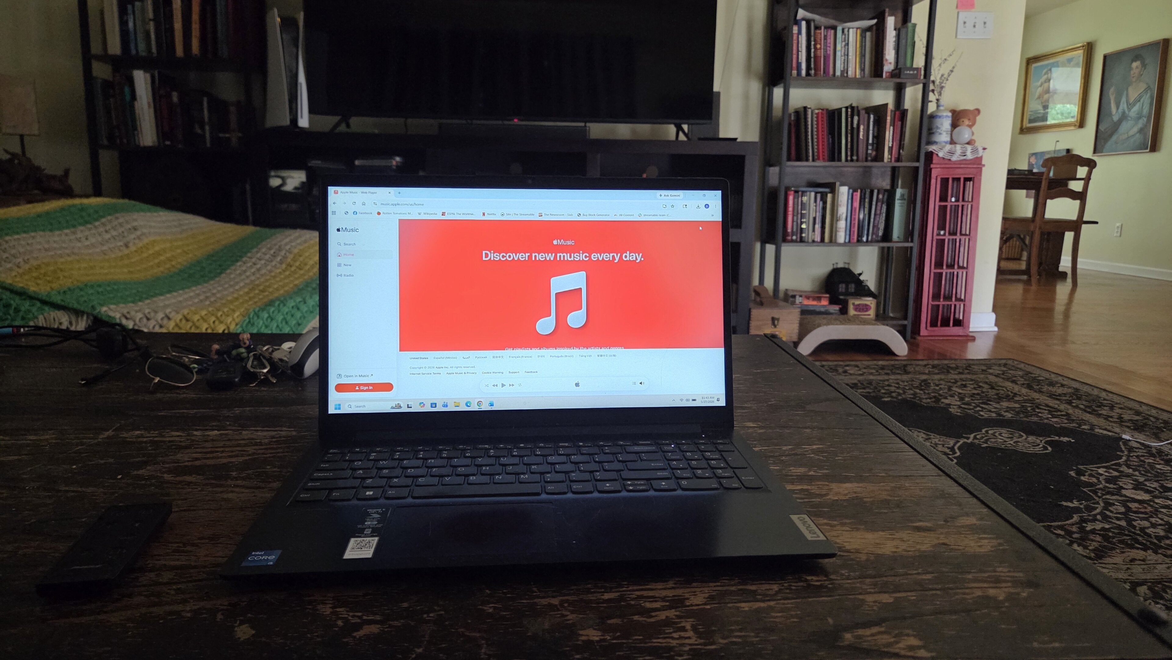 Apple Music on a laptop screen.