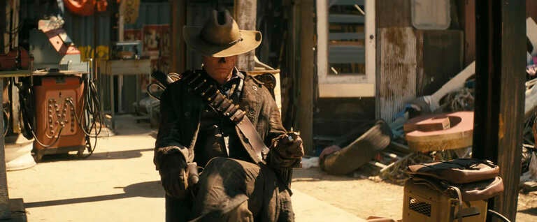 Walton Goggins sitting in character as The Ghoul in Prime Video's
